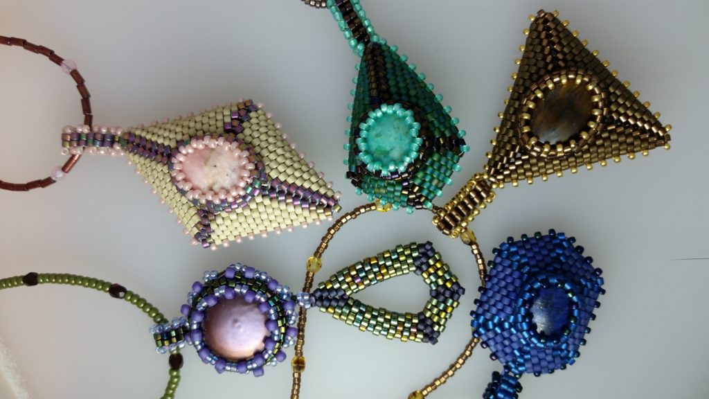 Beaded gemstone captured necklaces