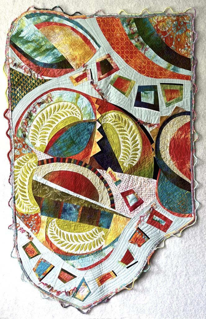 Finished Eye of the Storm quilt by Lynn Woll